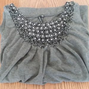 Size small grey sleeveless top with black collars